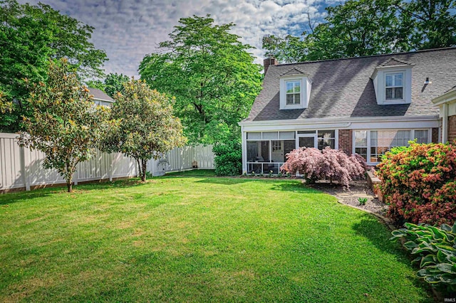 727 Mulberry St, Mount Vernon, IN 47620 - view of yard featuring a sunroom