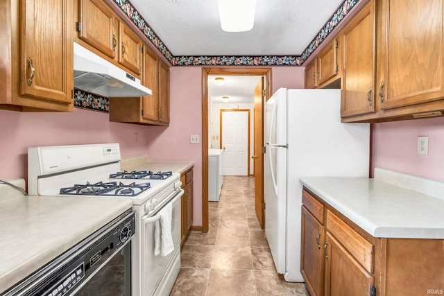 1723 Central St, Lafayette, IN 47905 - kitchen featuring under cabinet range hood, white appliances, brown cabinets, and light countertops