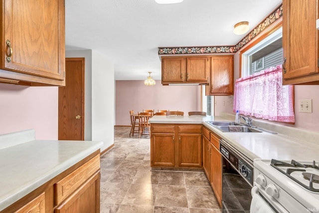 1723 Central St, Lafayette, IN 47905 - kitchen featuring dishwasher, white gas range, brown cabinets, and a peninsula