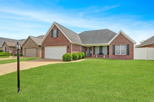 5849 Porterfield Dr, Evansville, IN 47711 - view of front of house with brick siding, driveway, a shingled roof, and covered porch