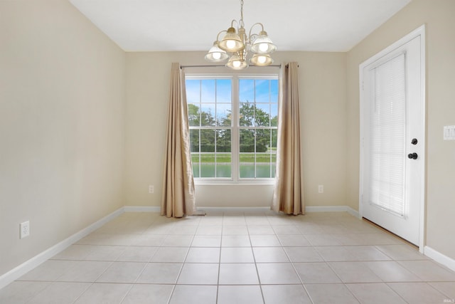 5849 Porterfield Dr, Evansville, IN 47711 - unfurnished dining area with a chandelier, baseboards, and light tile patterned floors