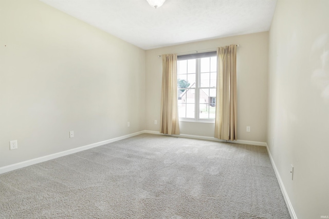 5849 Porterfield Dr, Evansville, IN 47711 - spare room with carpet flooring and baseboards