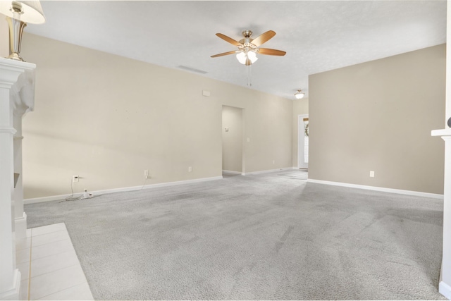 5849 Porterfield Dr, Evansville, IN 47711 - unfurnished living room featuring a ceiling fan, baseboards, and carpet flooring
