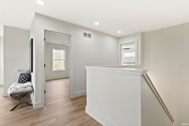 732 S Bend Ave, South Bend, IN 46617 - corridor featuring an upstairs landing, light wood-style floors, baseboards, and recessed lighting