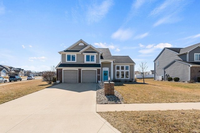 1507 Tara Bella Ln, Fort Wayne, IN 46845 - view of front of house with a garage, concrete driveway, and a front yard