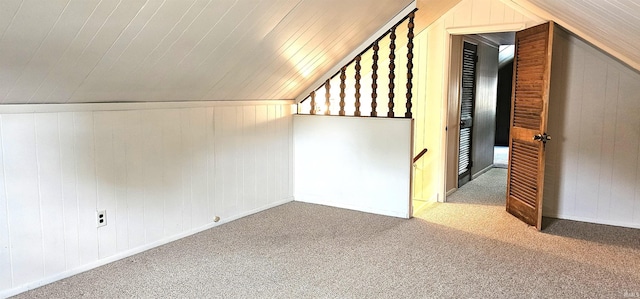 318 W Jefferson St, Chandler, IN 47610 - additional living space with vaulted ceiling, carpet floors, wooden walls, and wood ceiling