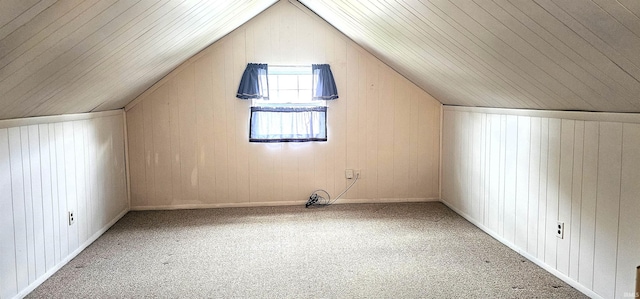 318 W Jefferson St, Chandler, IN 47610 - bonus room with carpet flooring, vaulted ceiling, and wood walls