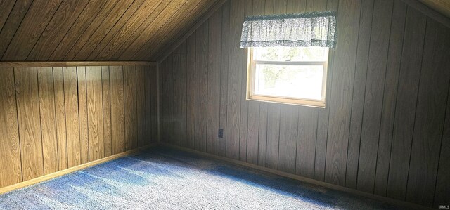 318 W Jefferson St, Chandler, IN 47610 - bonus room featuring vaulted ceiling, wood walls, and carpet flooring