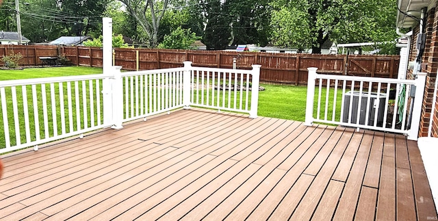 318 W Jefferson St, Chandler, IN 47610 - wooden terrace with view of wooded area