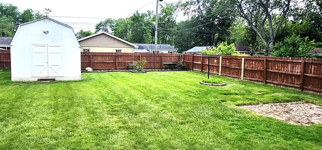 318 W Jefferson St, Chandler, IN 47610 - view of yard featuring a shed and an outbuilding