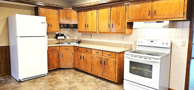 318 W Jefferson St, Chandler, IN 47610 - kitchen with white appliances, a sink, extractor fan, and brown cabinetry
