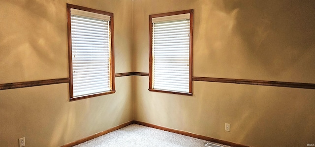 318 W Jefferson St, Chandler, IN 47610 - unfurnished room with carpet floors and baseboards