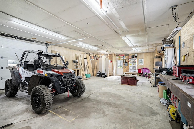 garage with a workshop area