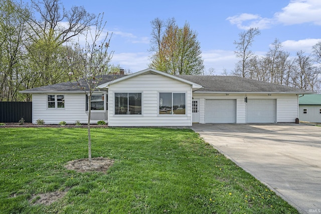 ranch-style house with an attached garage and concrete driveway
