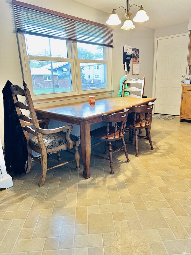 2912 W Twickingham Dr, Muncie, IN 47304 - dining space featuring a chandelier
