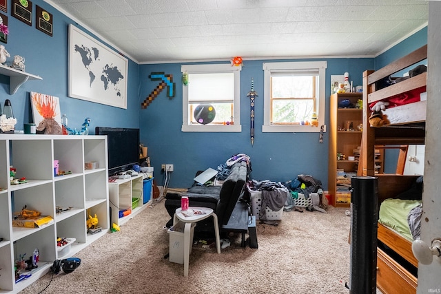 bedroom featuring carpet flooring and ornamental molding