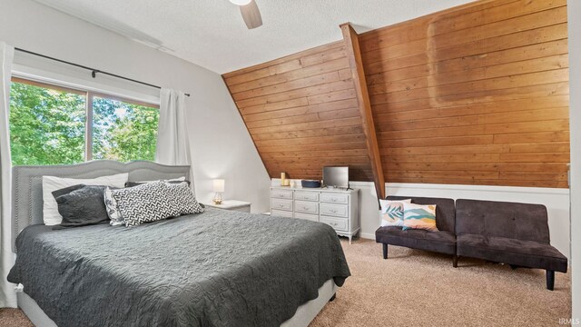 11381 NE Wawasee Dr, Syracuse, IN 46567 - bedroom with lofted ceiling, light carpet, and ceiling fan