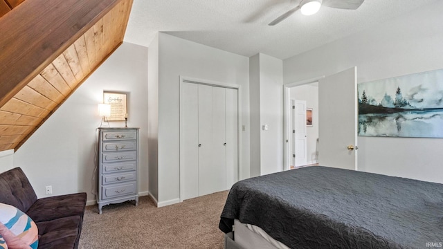 11381 NE Wawasee Dr, Syracuse, IN 46567 - bedroom with carpet floors, ceiling fan, a closet, vaulted ceiling, and baseboards