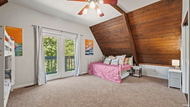 11381 NE Wawasee Dr, Syracuse, IN 46567 - bedroom with vaulted ceiling, access to outside, carpet floors, and a ceiling fan