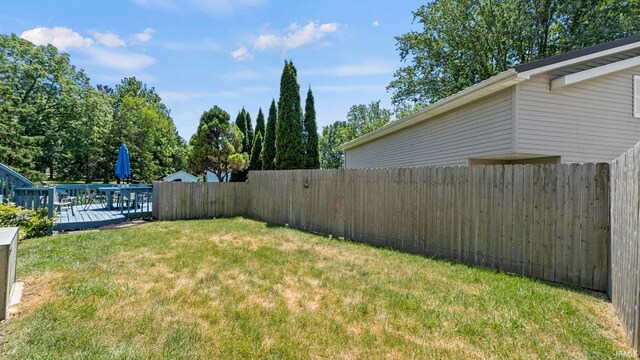 11381 NE Wawasee Dr, Syracuse, IN 46567 - view of yard featuring a deck