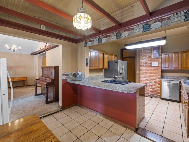 422 E Washingtion St, Oakland City, IN 47660 - kitchen with appliances with stainless steel finishes, light tile patterned floors, a chandelier, beam ceiling, and brown cabinets