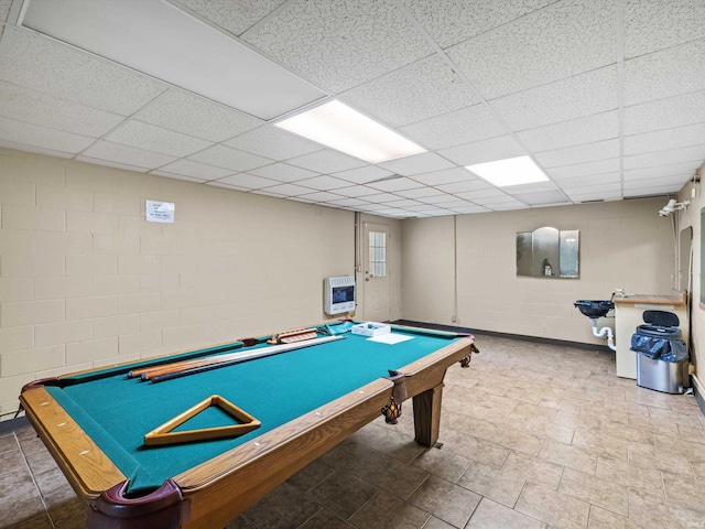 422 E Washingtion St, Oakland City, IN 47660 - playroom featuring concrete block wall, billiards, heating unit, and a paneled ceiling
