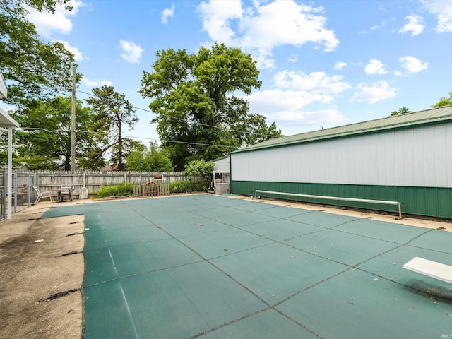 422 E Washingtion St, Oakland City, IN 47660 - view of pool with a diving board, a fenced backyard, and a patio area