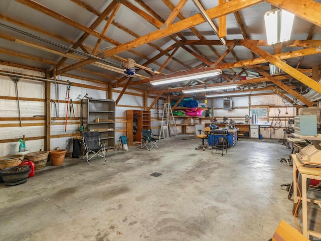 422 E Washingtion St, Oakland City, IN 47660 - garage with a workshop area and a garage door opener