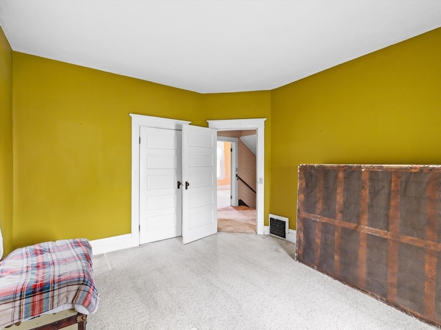422 E Washingtion St, Oakland City, IN 47660 - carpeted bedroom with baseboards