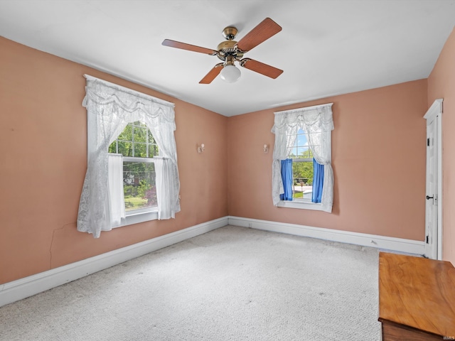 422 E Washingtion St, Oakland City, IN 47660 - spare room with carpet floors, baseboards, and ceiling fan