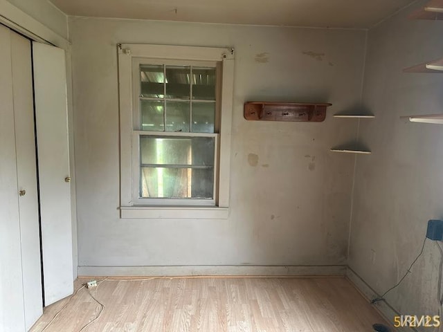 128 S Main St, Griffin, IN 47616 - unfurnished room featuring wood finished floors and baseboards