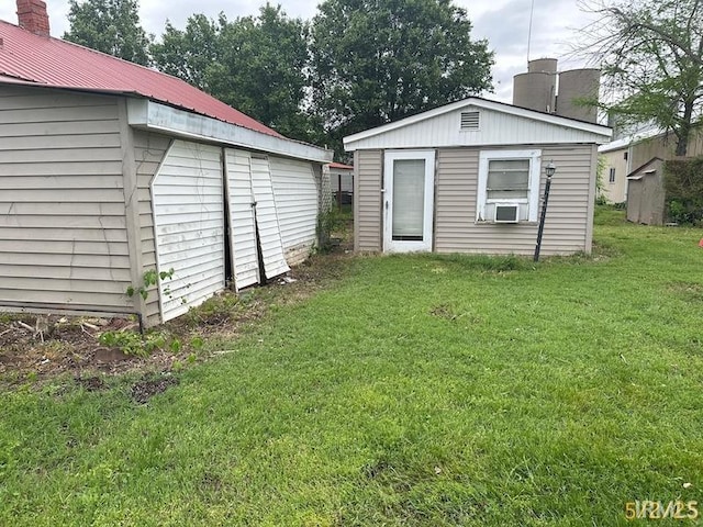 128 S Main St, Griffin, IN 47616 - view of green lawn featuring an outbuilding and cooling unit