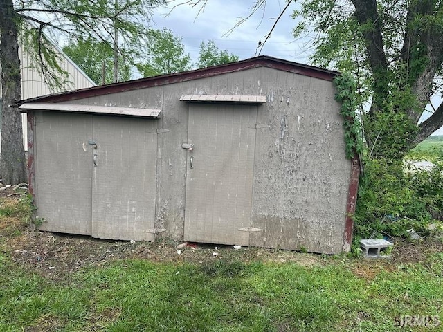 128 S Main St, Griffin, IN 47616 - garage with a storage unit