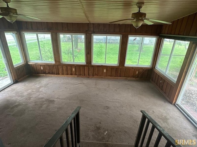 128 S Main St, Griffin, IN 47616 - unfurnished sunroom with healthy amount of natural light and carpet