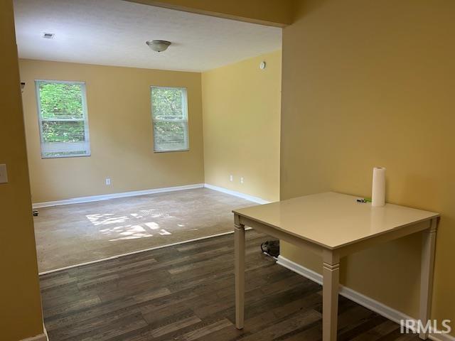 1221 N Lindbergh Dr, Bloomington, IN 47404 - unfurnished office featuring wood finished floors and baseboards