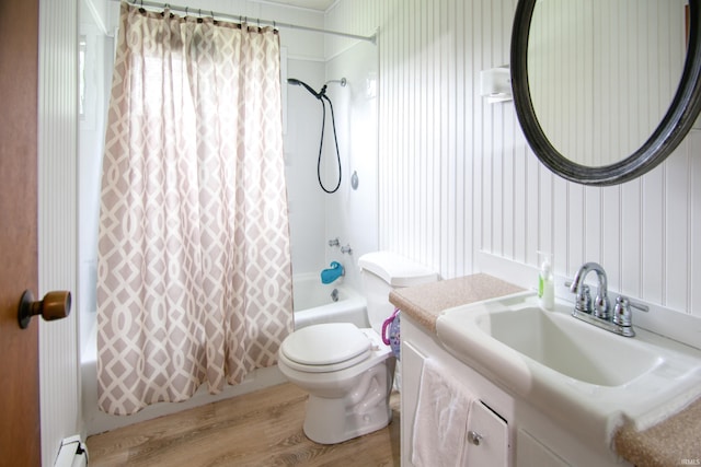 1818 Chochtimar Trl, Fort Wayne, IN 46808 - bathroom featuring shower / bath combo with shower curtain, wood finished floors, a baseboard radiator, vanity, and toilet