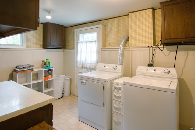 1818 Chochtimar Trl, Fort Wayne, IN 46808 - clothes washing area with independent washer and dryer, cabinet space, a wainscoted wall, light floors, and wallpapered walls