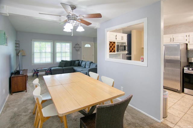 1818 Chochtimar Trl, Fort Wayne, IN 46808 - dining area featuring a ceiling fan, baseboards, and light colored carpet