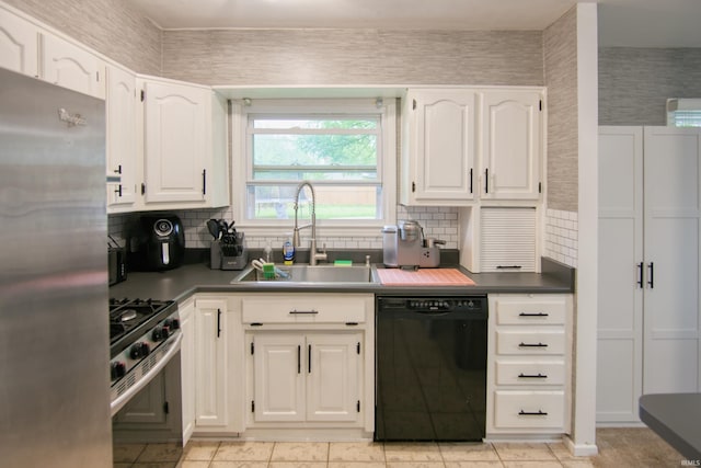 1818 Chochtimar Trl, Fort Wayne, IN 46808 - kitchen with appliances with stainless steel finishes, a sink, white cabinetry, and tasteful backsplash