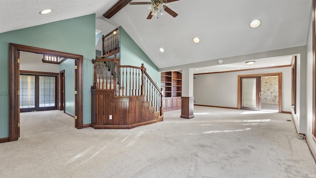 unfurnished living room with baseboards, carpet, stairs, recessed lighting, and ceiling fan