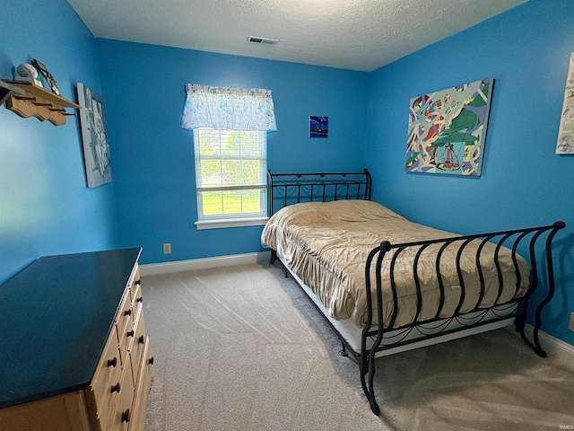 1804 Canyon Creek Dr, Lafayette, IN 47909 - carpeted bedroom featuring baseboards and a textured ceiling