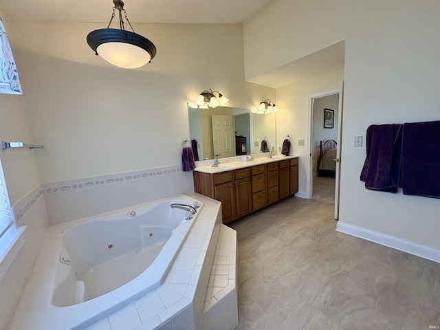 1804 Canyon Creek Dr, Lafayette, IN 47909 - ensuite bathroom featuring vanity, a jetted tub, and baseboards