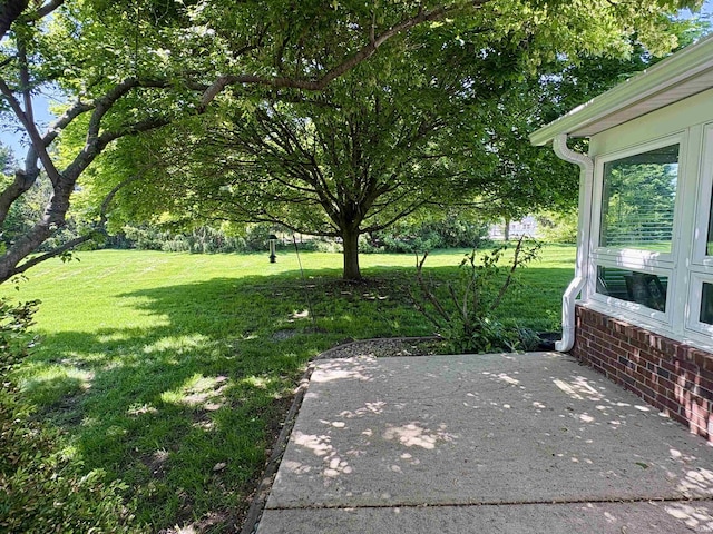 1804 Canyon Creek Dr, Lafayette, IN 47909 - view of grassy yard featuring a patio