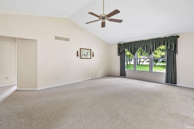 empty room with carpet, a ceiling fan, lofted ceiling, and baseboards