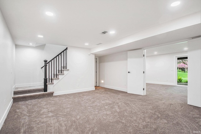 16166 Candlewycke Ct, Granger, IN 46530 - below grade area with carpet floors, recessed lighting, baseboards, and stairs