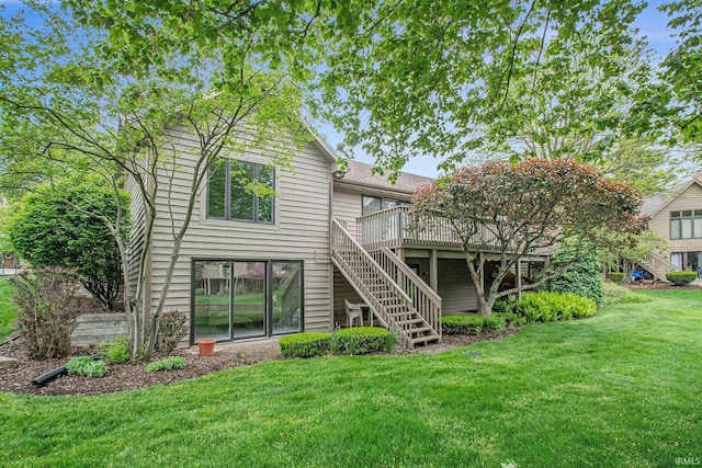 16166 Candlewycke Ct, Granger, IN 46530 - back of property featuring stairway, a deck, and a lawn