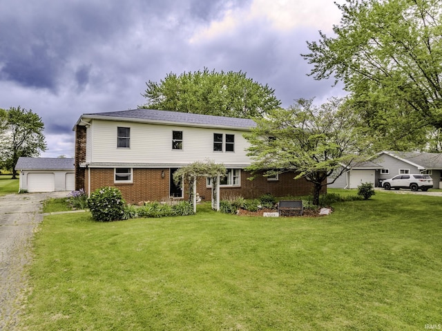 11009 S County Road 300 W, Muncie, IN 47302 - traditional-style house with a front yard, brick siding, an outbuilding, and a garage