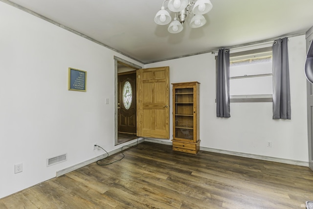 11009 S County Road 300 W, Muncie, IN 47302 - entryway featuring a chandelier, dark wood-style flooring, and baseboards