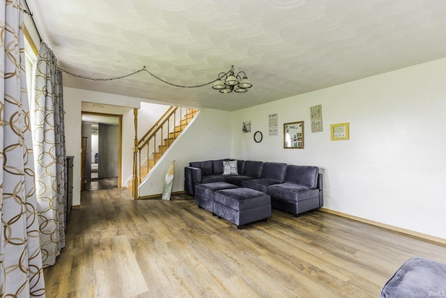 11009 S County Road 300 W, Muncie, IN 47302 - living area with wood finished floors, stairs, and baseboards