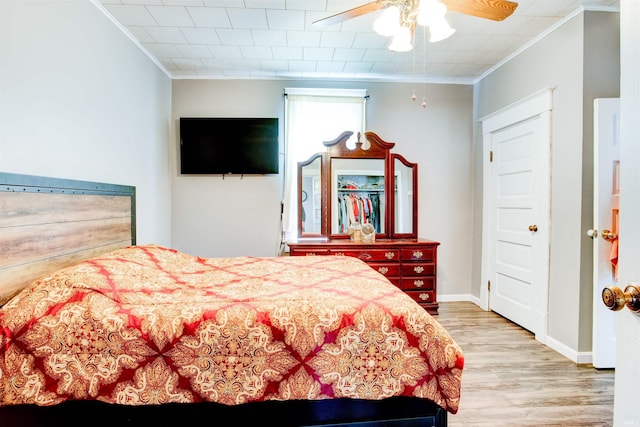 1409 Main St, Vincennes, IN 47591 - bedroom featuring crown molding, wood finished floors, and a ceiling fan
